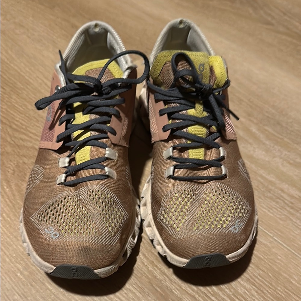 On Running Brown and Yellow Athletic Shoes with Breathable Design